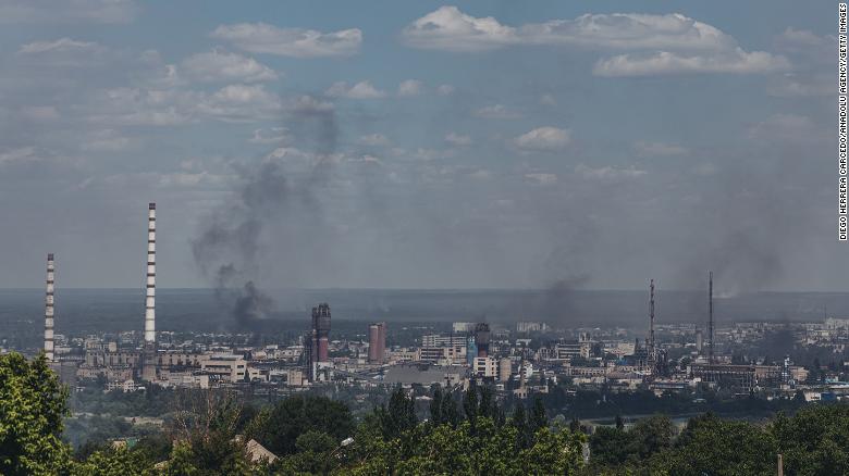 LUHANSK, UKRAINE - JUNE 8: Smoke rises from the city of Severodonetsk seen from Lisichansk, Luhansk Oblast, Ukraine, on June 8, 2022. (Photo by Diego Herrera Carcedo/Anadolu Agency via Getty Images)