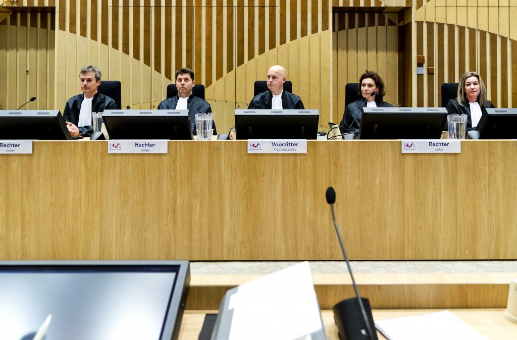 epa08280371 The judges have taken their seats in the courtroom of the heavily secured Schiphol Judicial Complex (SJC), at the start of the international MH17 trial in Badhoevedorp, The Netherlands, 09 March 2020. The District Court of The Hague is set to hold its hearings for the international criminal trial on the downing of Malaysia Airlines Flight MH17 at the heavily-protected SJC. The Netherlands' Public Prosecution Service has issued international arrest warrants against four suspects (three Russians and a Ukrainian citizen) for allegedly bringing down the passenger jet. The plane crashed in eastern Ukraine on 17 July 2014, presumably after being shot down by a Buk surface-to-air missile amid the armed conflict in the Donbass region. All 283 passengers and 15 crew members, belonging to 10 different nationalities, were killed.  EPA-EFE/REMKO DE WAAL