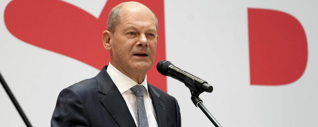 Olaf Scholz, top candidate for chancellor of the Social Democratic Party (SPD), speaks during a press conference at the party's headquarters in Berlin, Germany, Monday, Sept. 27, 2021. The center-left Social Democrats have won the biggest share of the vote in Germany's national election. They narrowly beat outgoing Chancellor Angela Merkel's center-right Union bloc in a closely fought race that will determine who succeeds the long-time leader at the helm of Europe's biggest economy. (AP Photo/Michael Sohn)